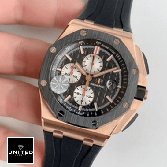 ASudemars Piguet Royal Oak Black Dial Gold Case Replica on the hand