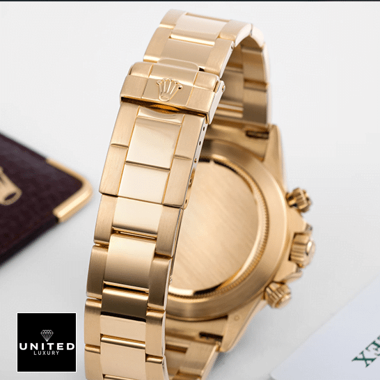 Rolex Daytona Chronograph Replica 4 Rolex Daytona 116523 Yellow Gold Oyster Bracelet on the Rolex Logo Replica