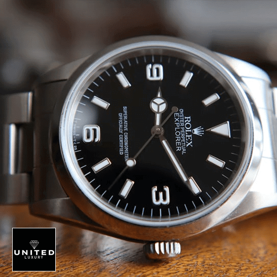 Rolex 124270 Replica 5 Rolex Explorer 124270 Stainless Steel Case and Bezel Replica on a wooden table